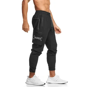 Moški Bodybuilding Hlače 2020 Jeseni in pozimi novo Tek Moških Sweatpants Slim Fit Hlače modni Šport, ki Teče Hlače